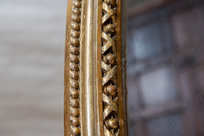 A Large Mid-19th Century Oval Mirror