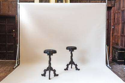 A Pair of Ebony Tripod Stands