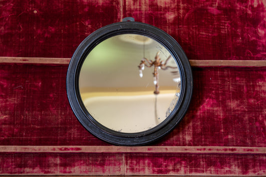 A Small Regency Concave Mirror in an Ebonised Frame