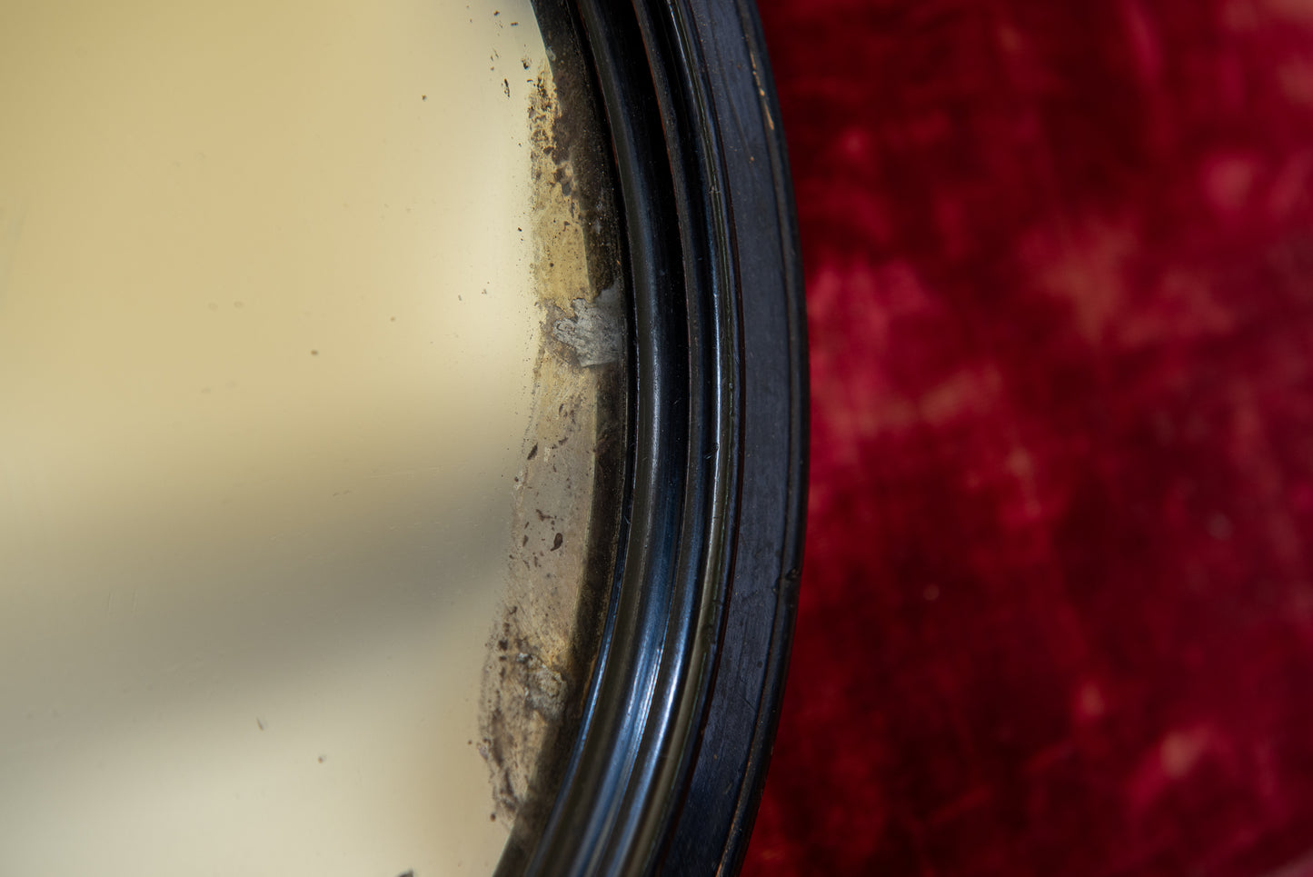 A Small Regency Concave Mirror in an Ebonised Frame
