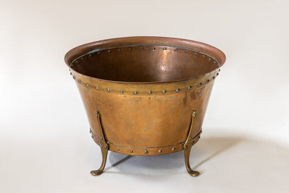 A Riveted & Hammered Copper Vessel