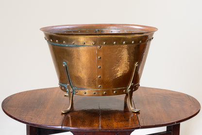 A Riveted & Hammered Copper Vessel